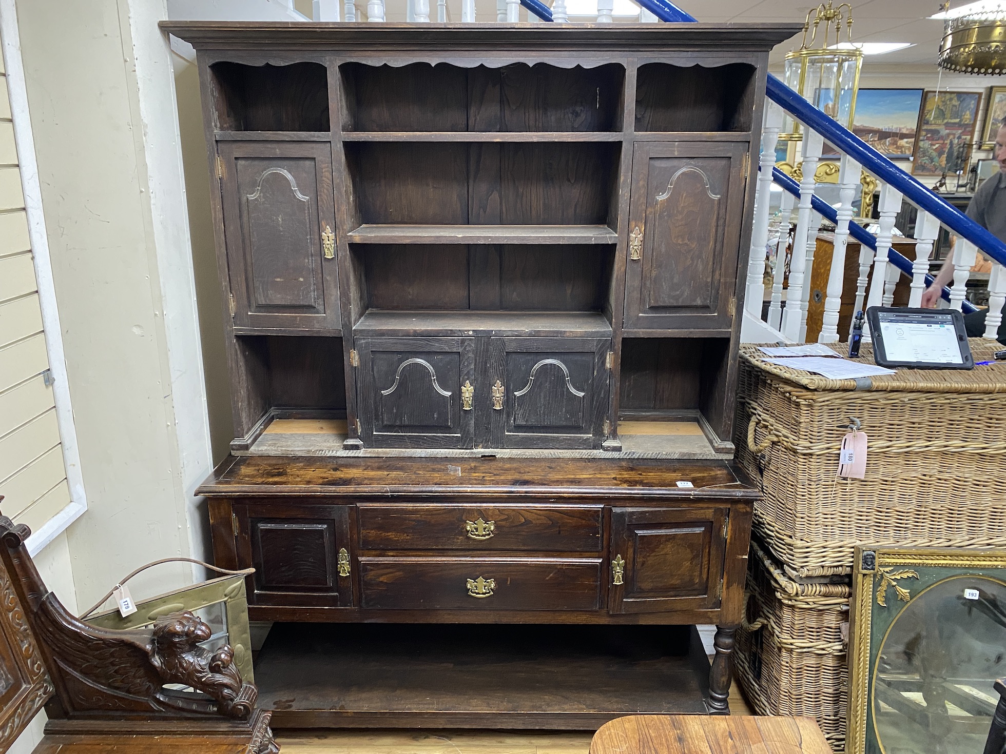 A George III style oak dresser with associated rack top, length 156cm, depth 54cm, height 211cm